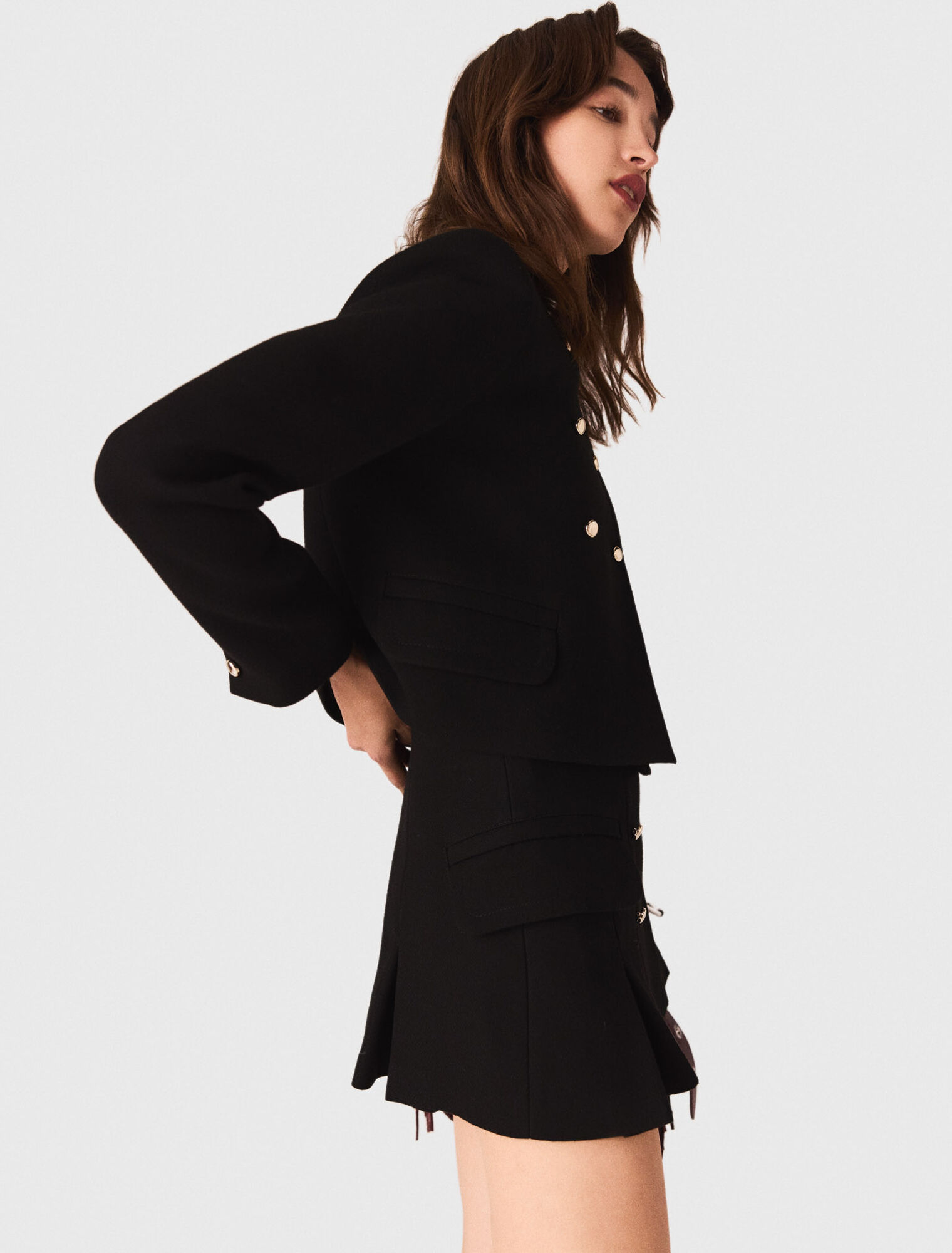 Short jacket with gold buttons