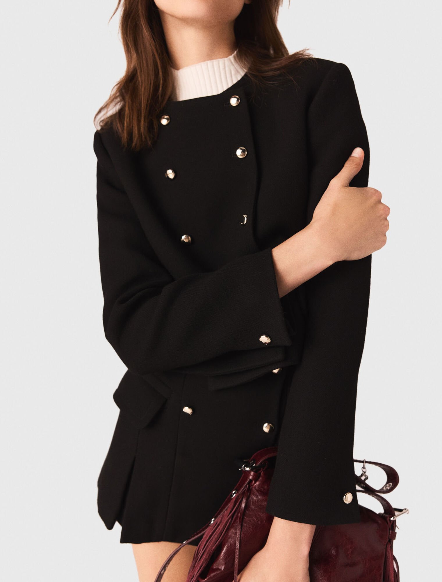 Short jacket with gold buttons