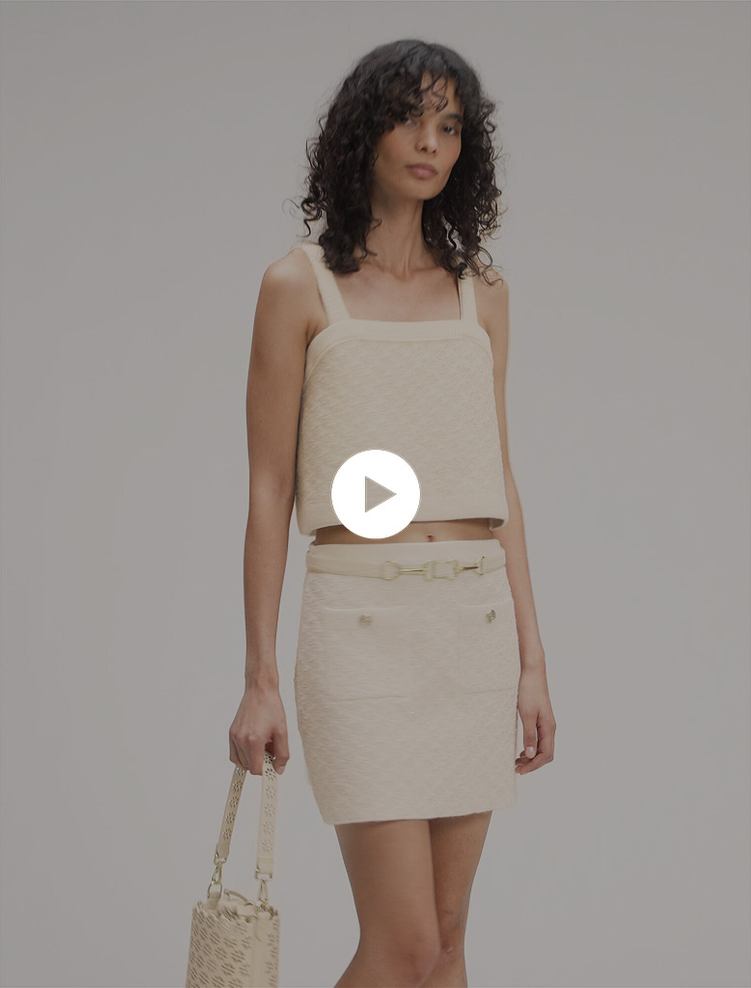 Tweed-effect knitted skirt Tweed-effect knitted skirt