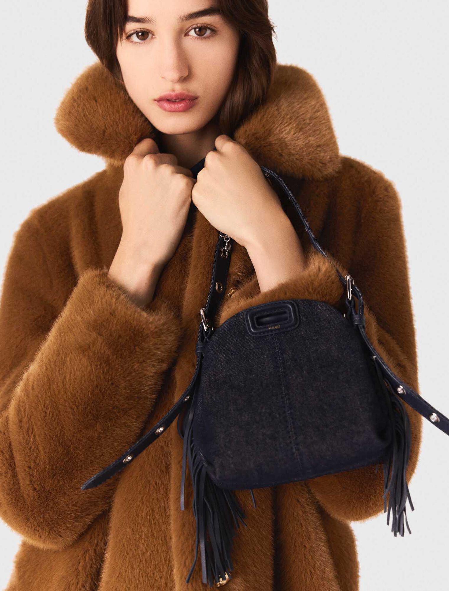 Mid-length faux fur coat Mid-length faux fur coat