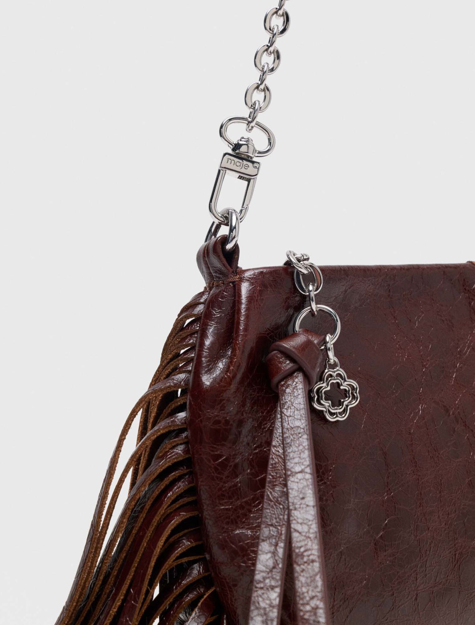 Patent leather Miss M clutch bag