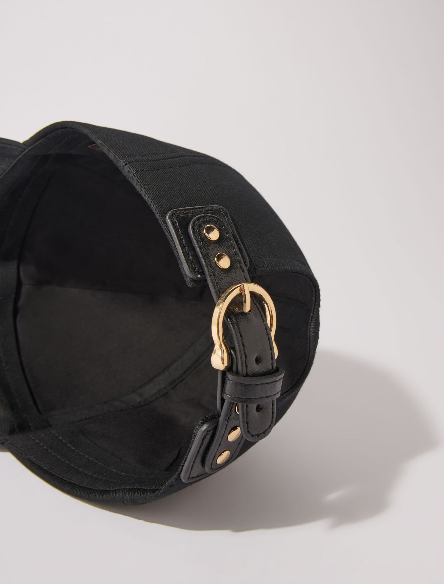 Cotton cap with gold-tone buckle
