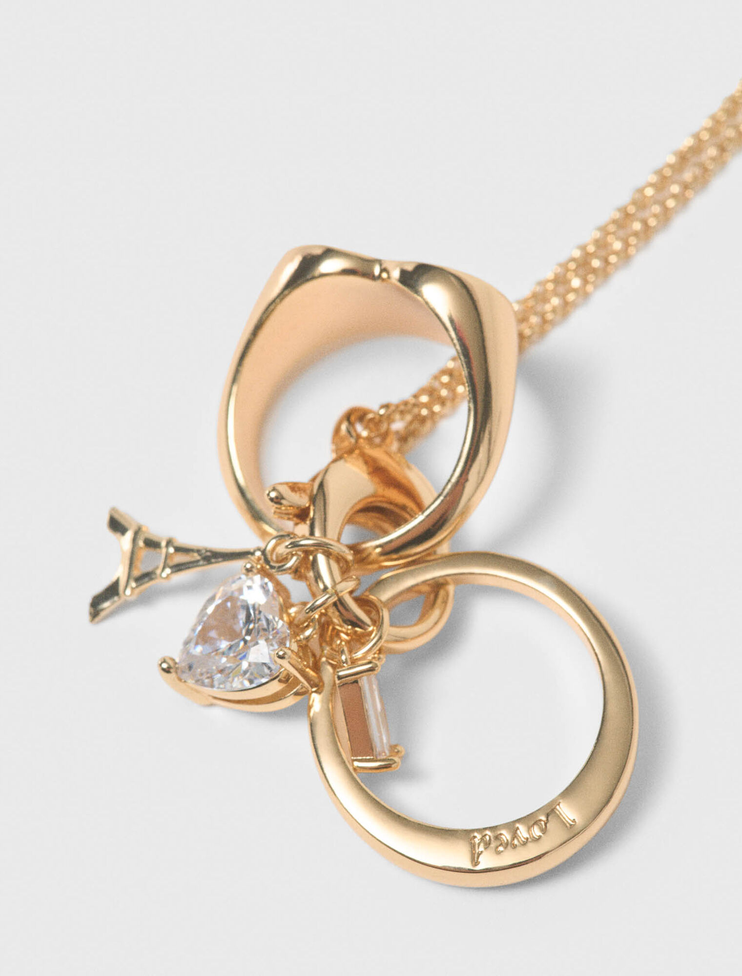 Goldtone necklace with ring details