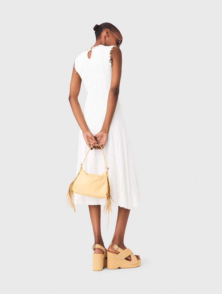 Knit dress with gold jewellery