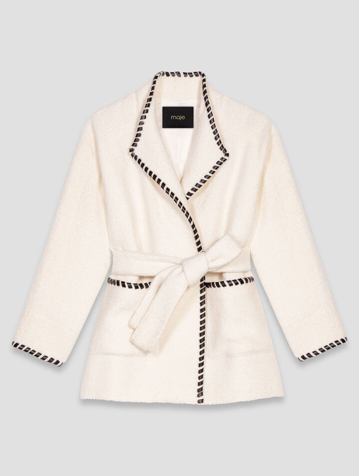 Lined coat with contrasting ribbon Lined coat with contrasting ribbon