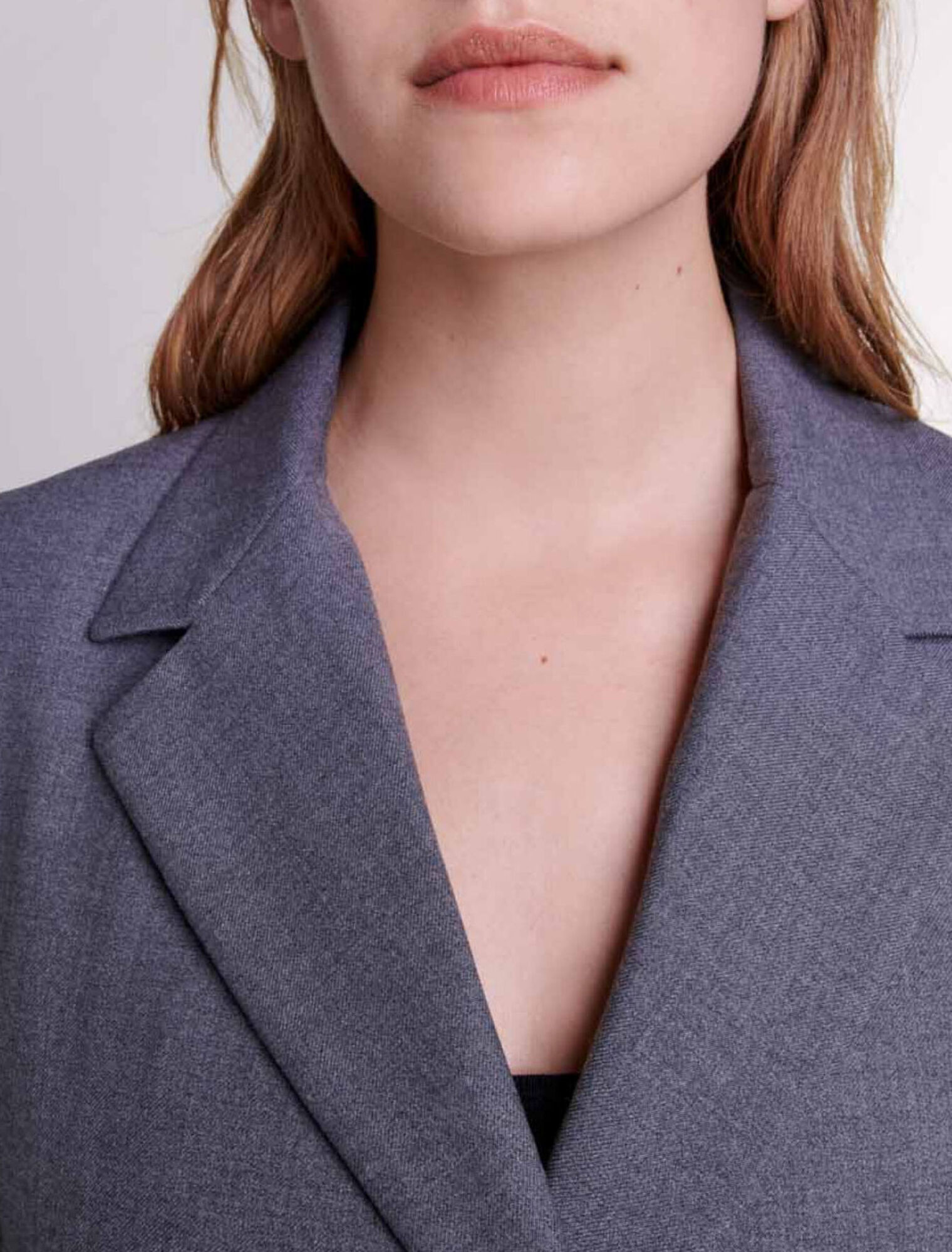 Suit jacket with chain belt