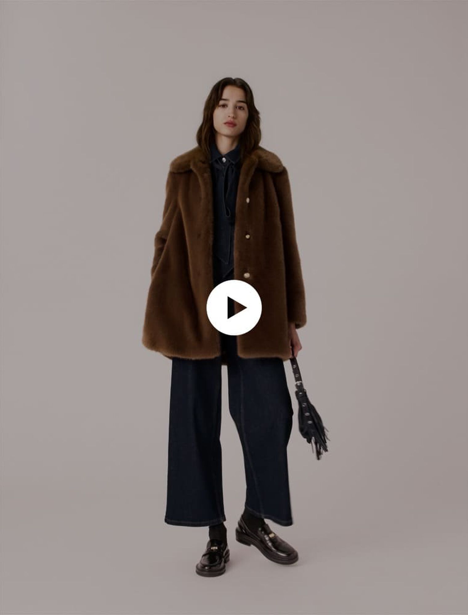 Mid-length faux fur coat Mid-length faux fur coat