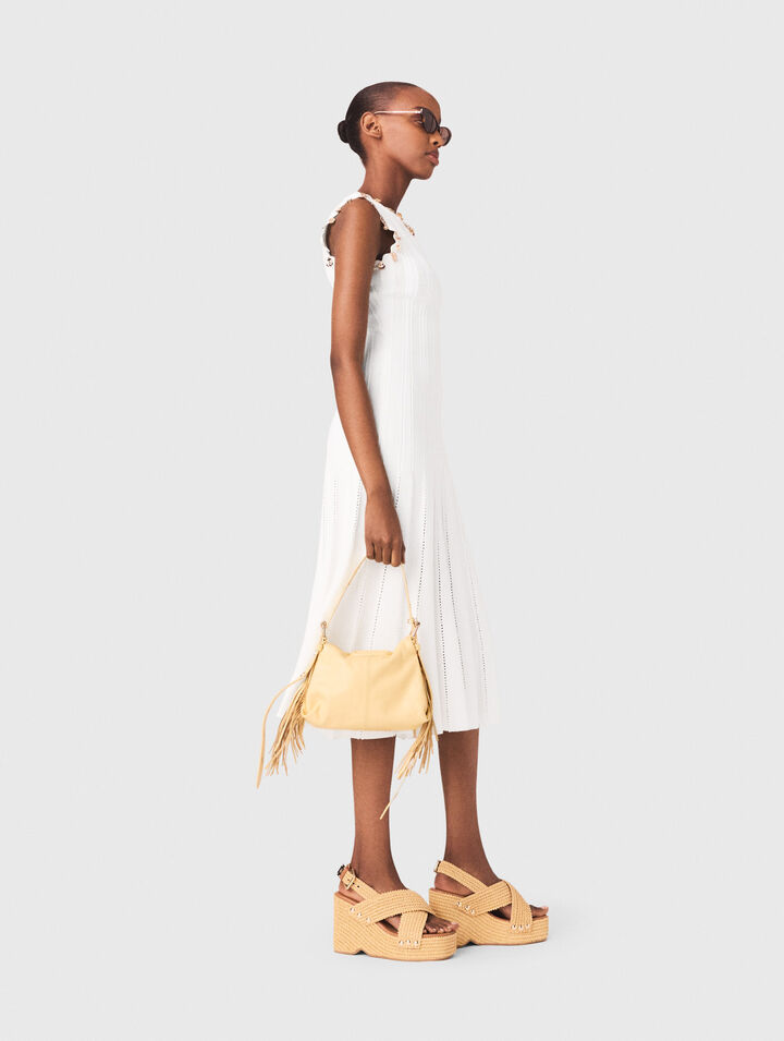 Knit dress with gold jewellery