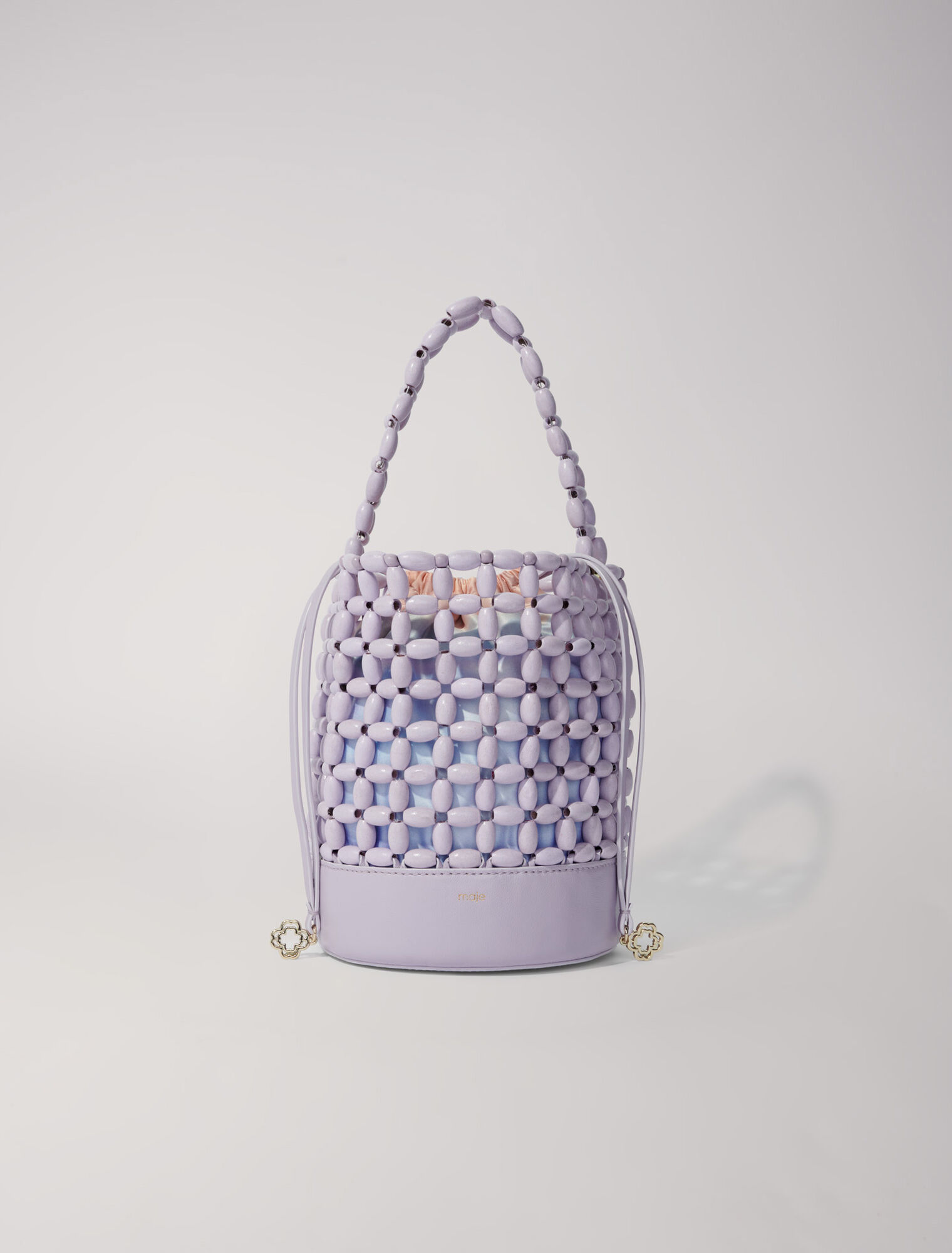 Bucket bag embellished with beads Bucket bag embellished with beads