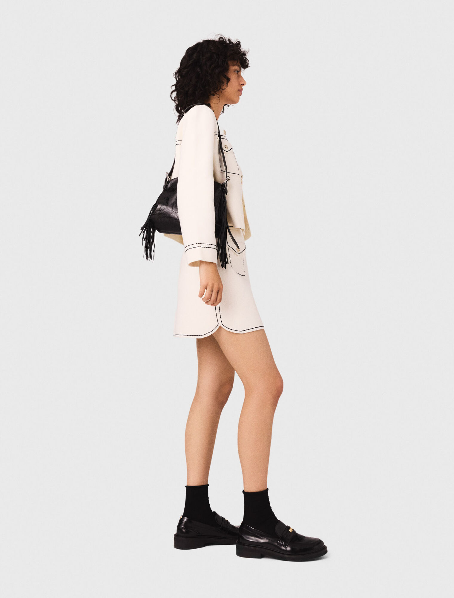 Short topstitched knit skirt