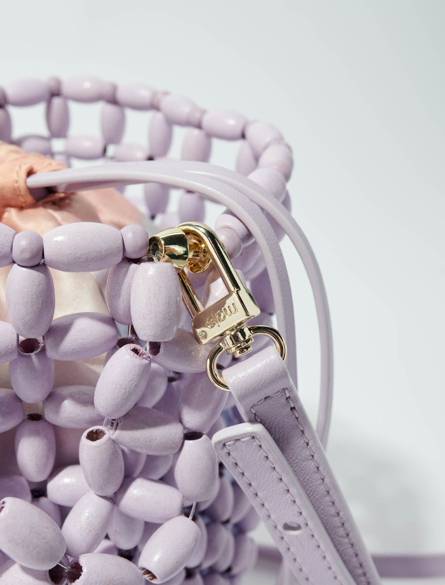 Bucket bag embellished with beads Bucket bag embellished with beads