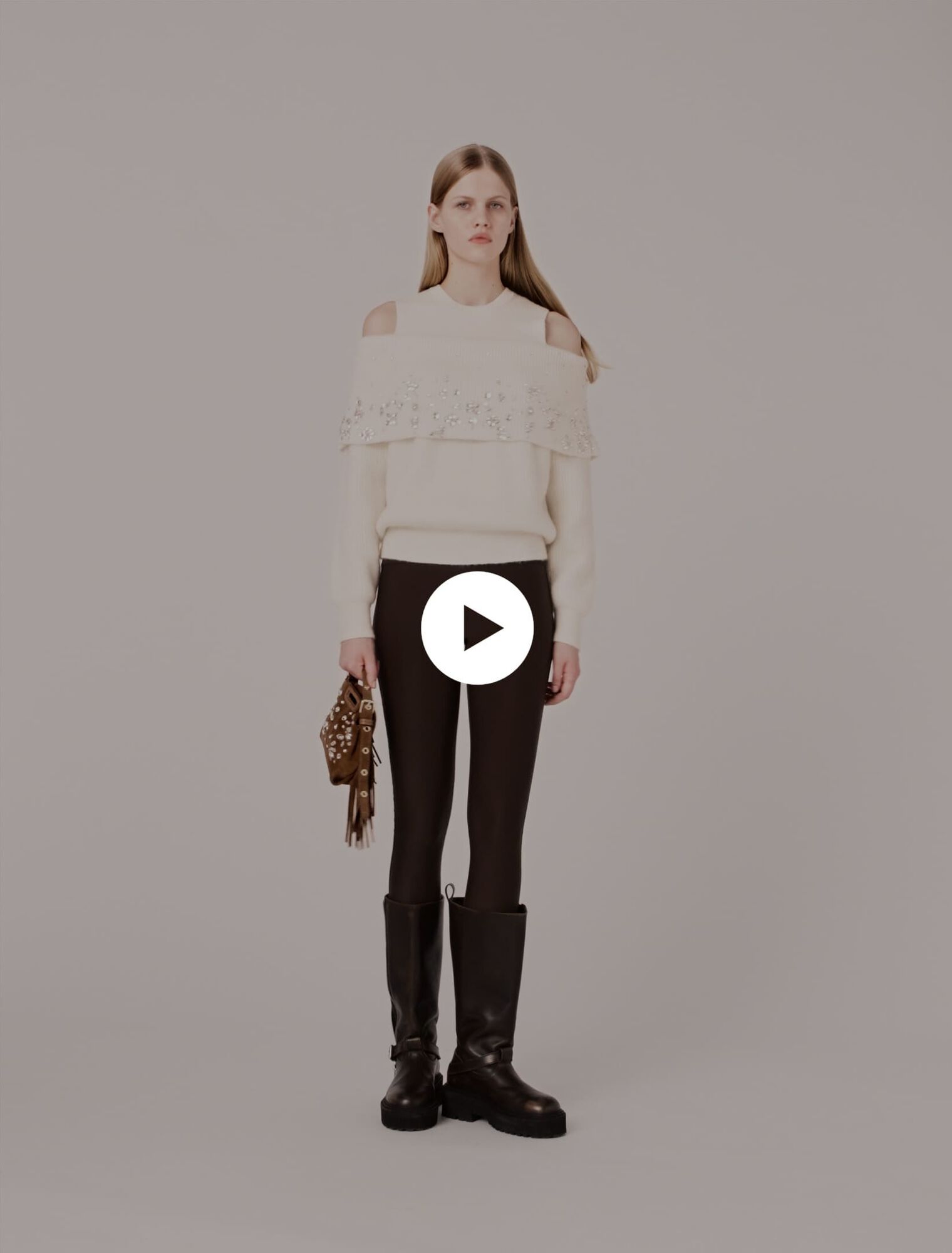 Off-the-shoulder jumper with jewellery