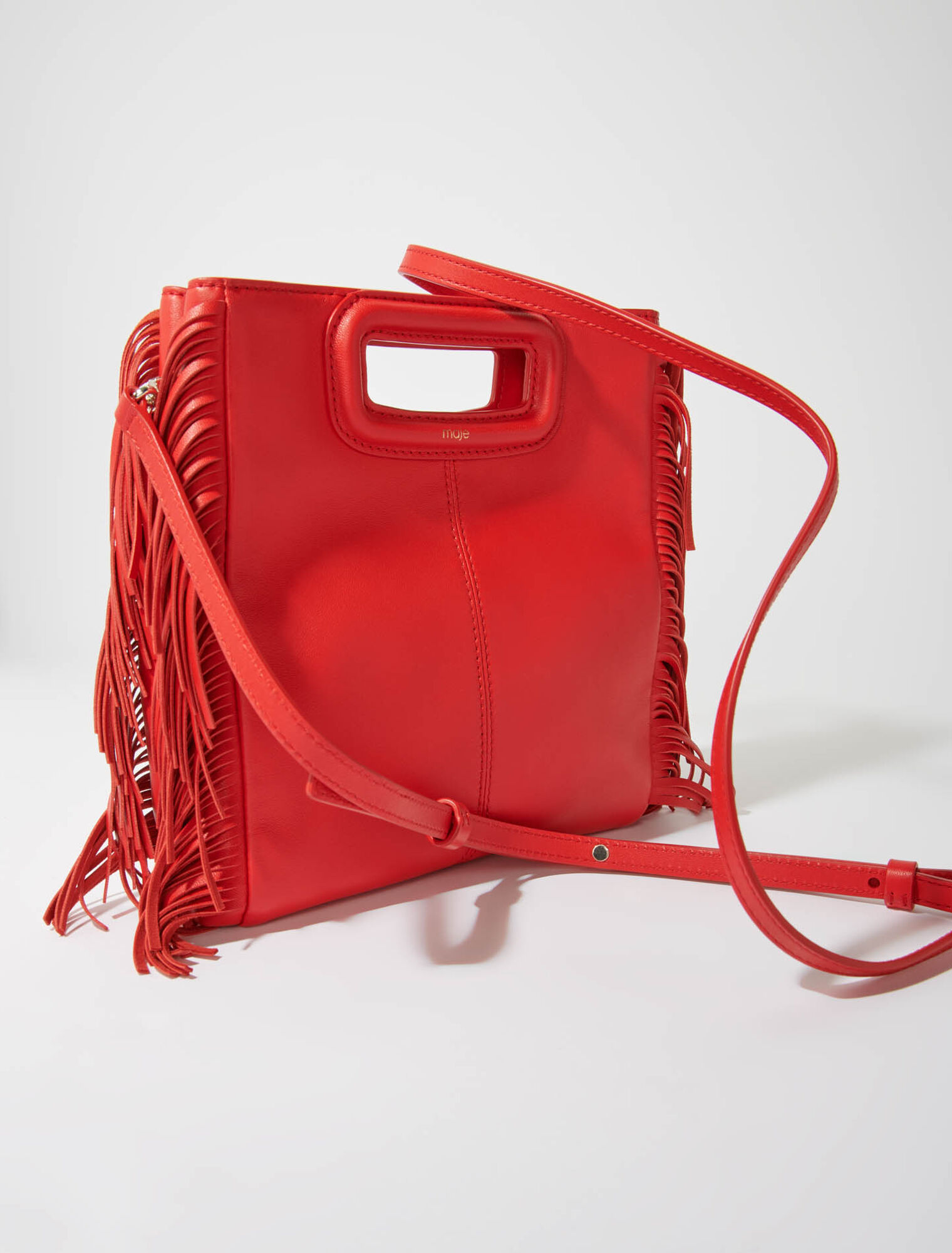 Smooth leather M bag with fringing