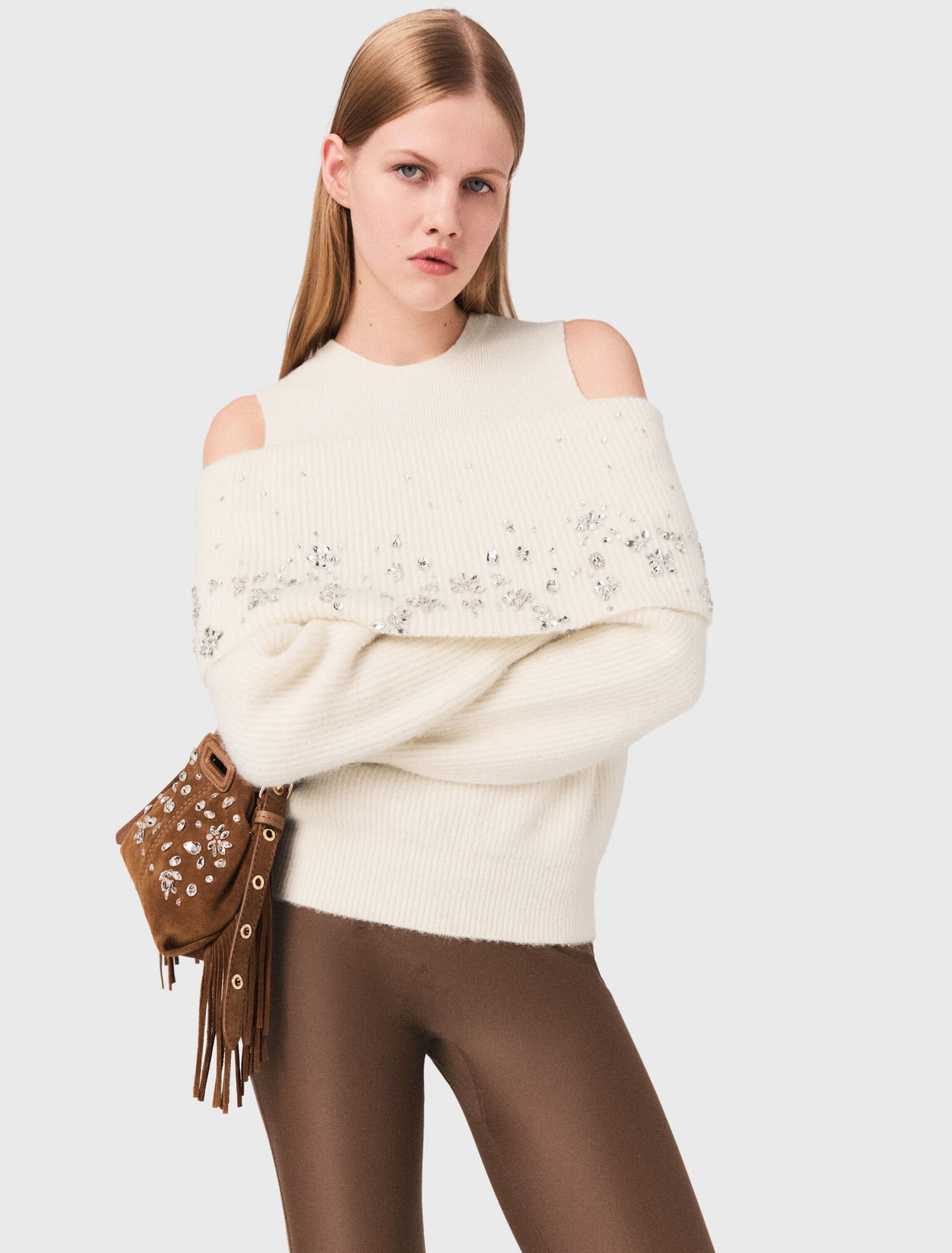 Off-the-shoulder jumper with jewellery