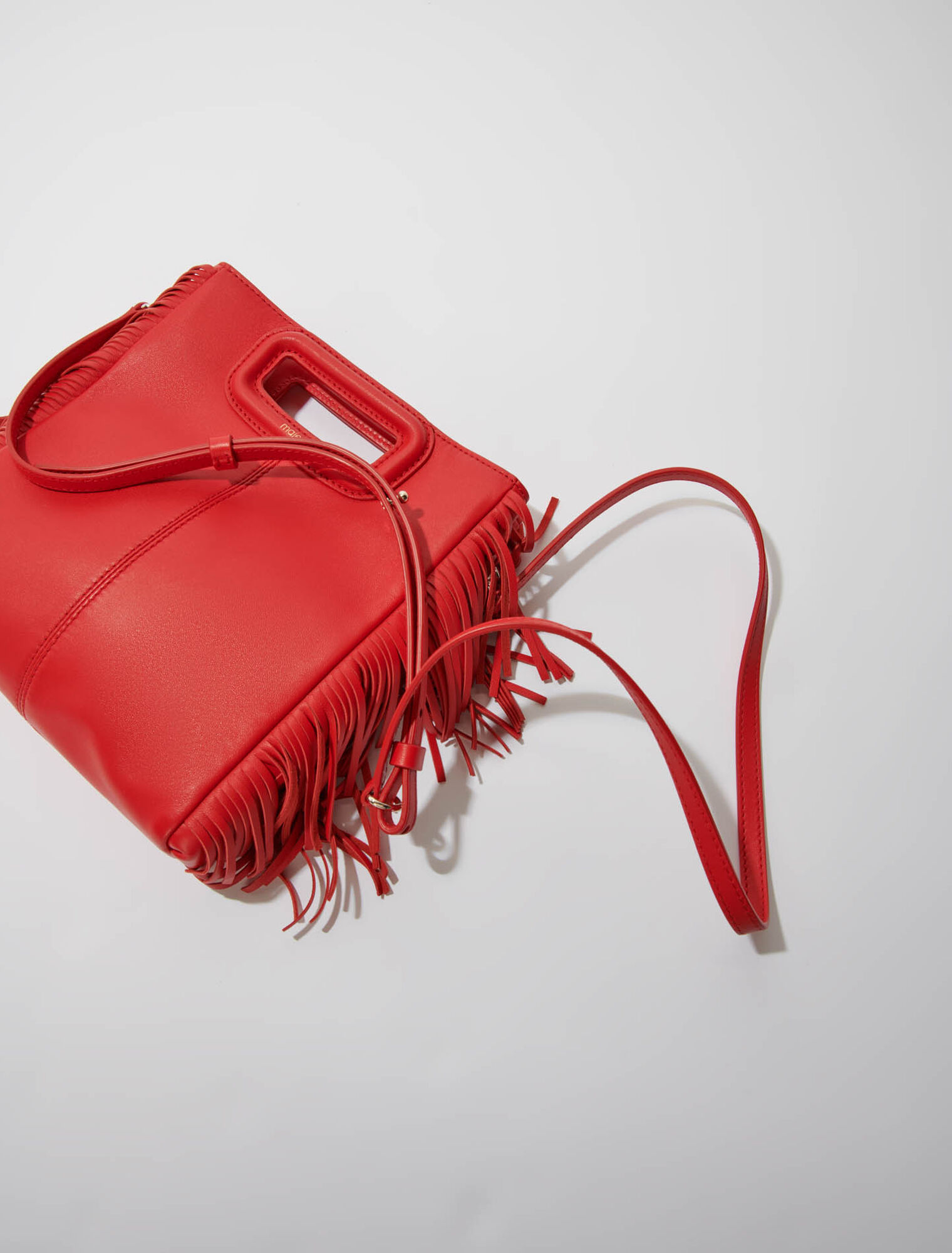Smooth leather M bag with fringing