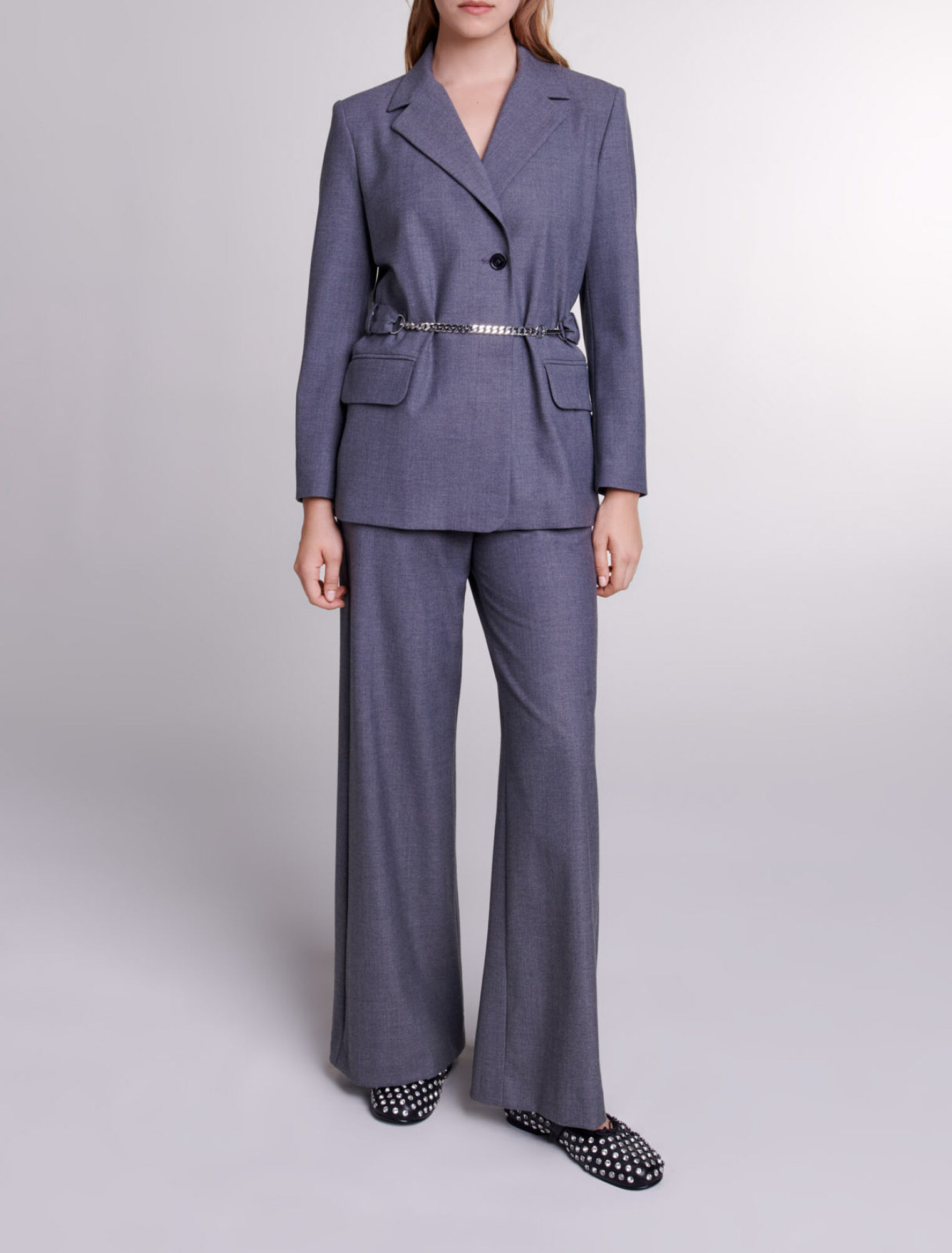 Suit jacket with chain belt