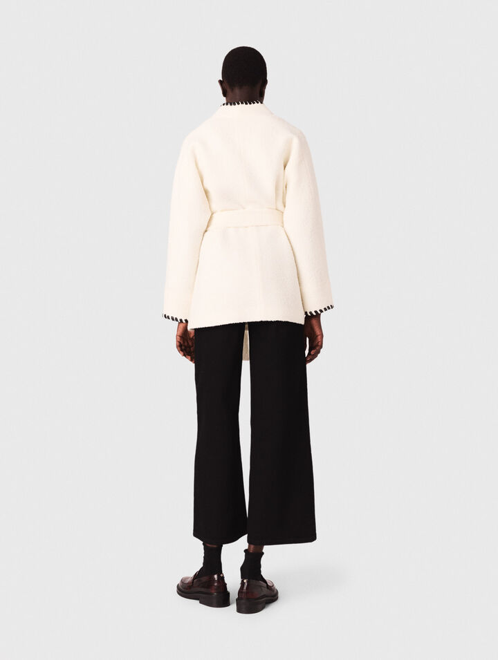 Lined coat with contrasting ribbon Lined coat with contrasting ribbon