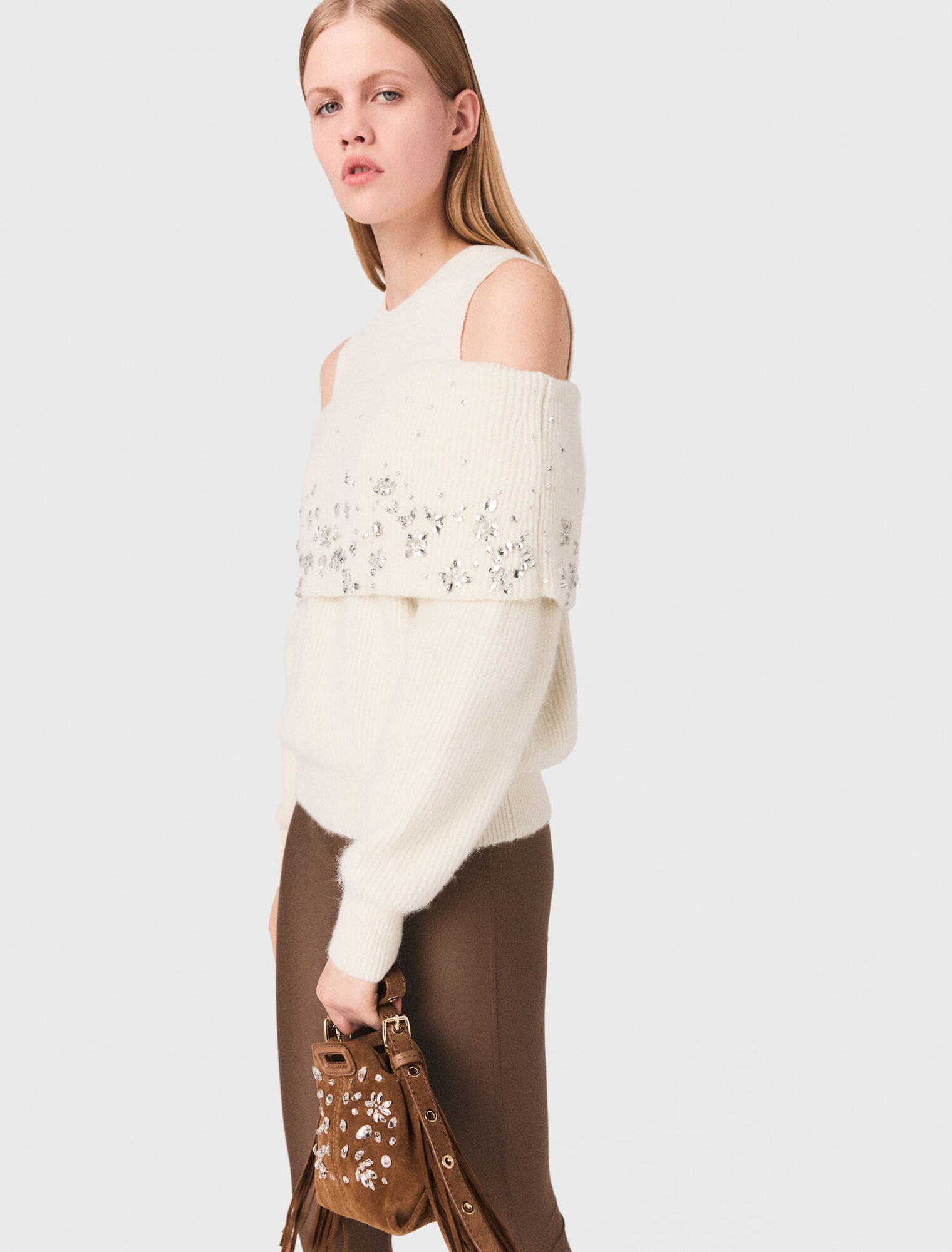 Off-the-shoulder jumper with jewellery