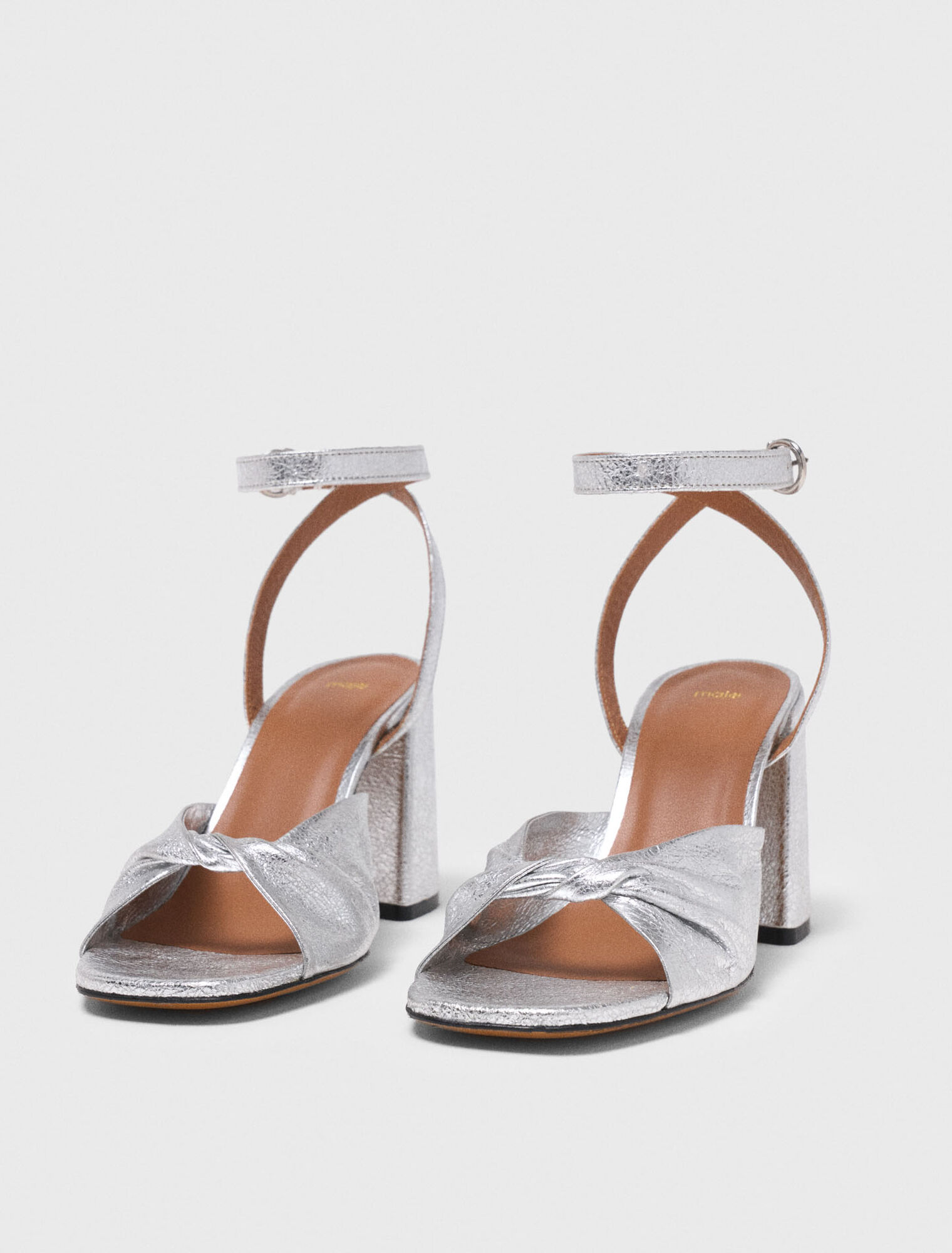 Metallic leather sandals with heels