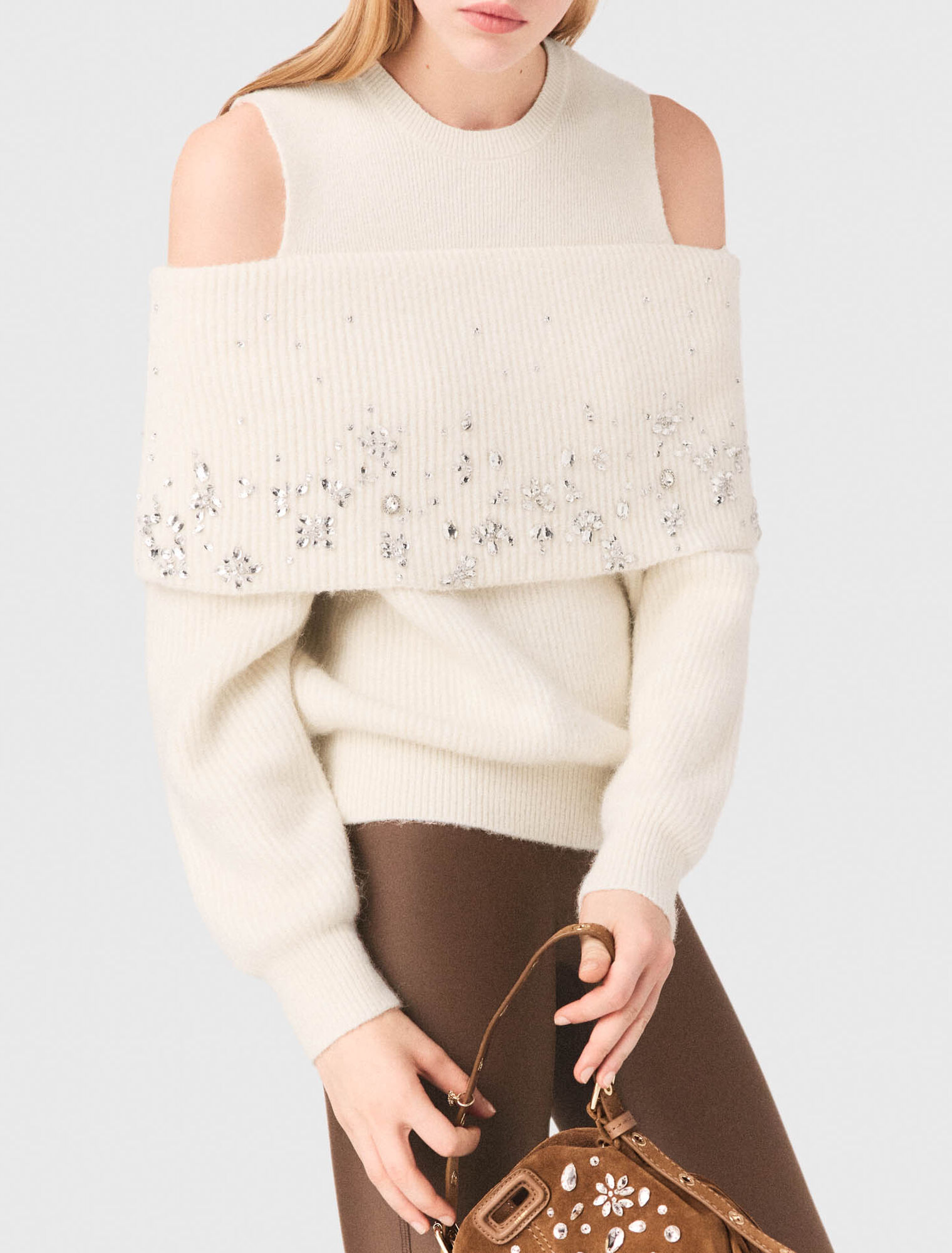 Off-the-shoulder jumper with jewellery