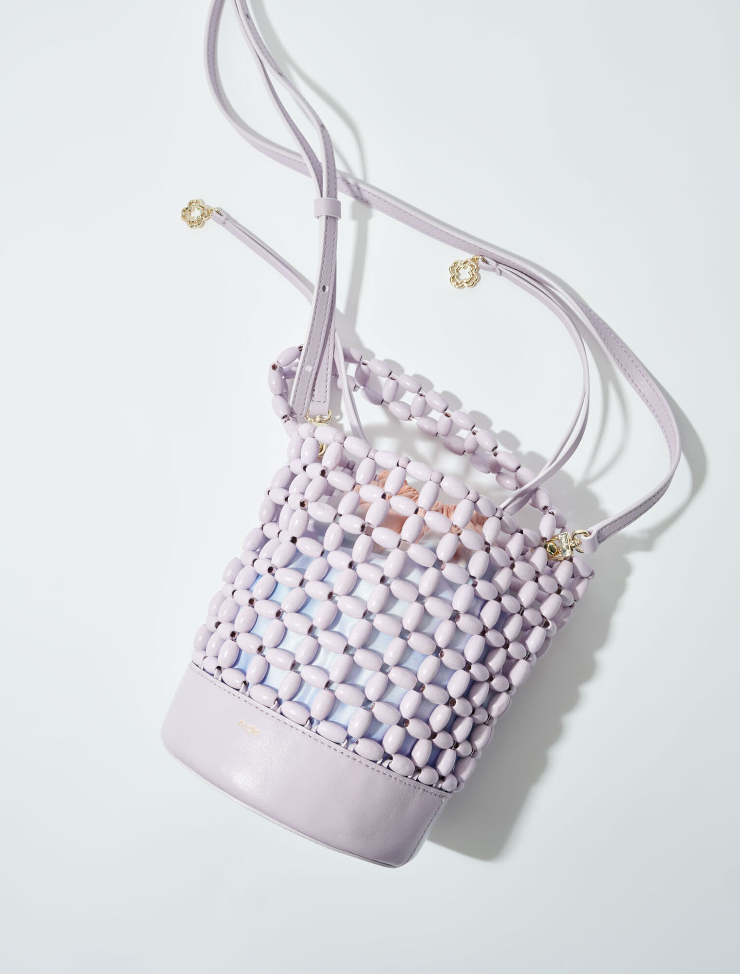 Bucket bag embellished with beads Bucket bag embellished with beads