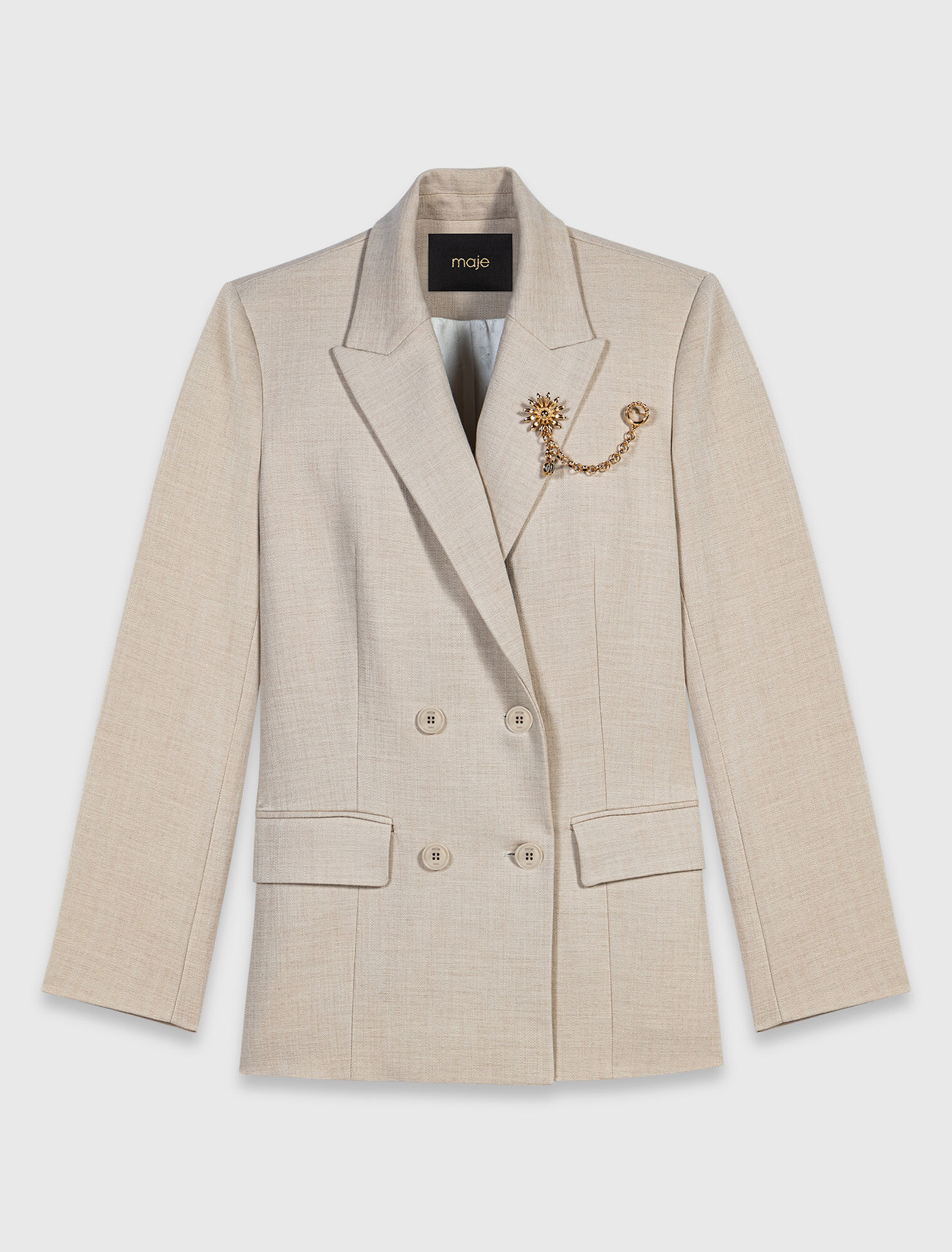 Suit jacket with brooch