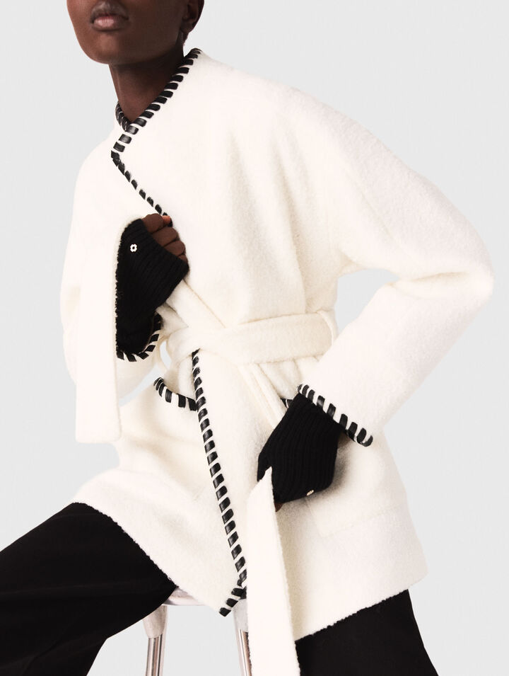Lined coat with contrasting ribbon Lined coat with contrasting ribbon