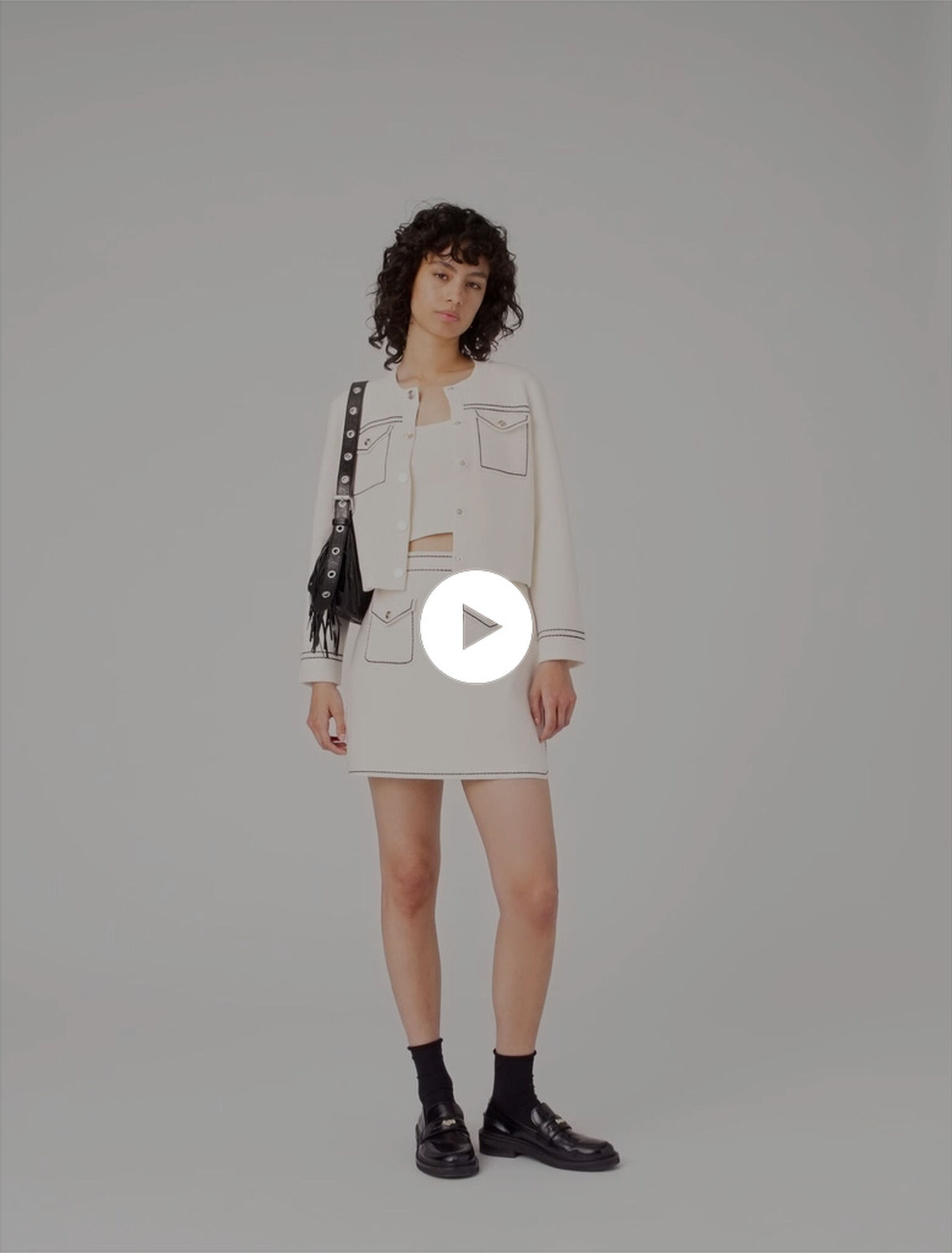 Short topstitched knit skirt