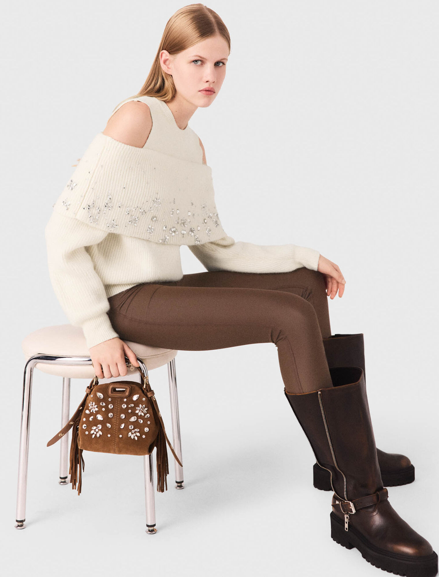 Off-the-shoulder jumper with jewellery