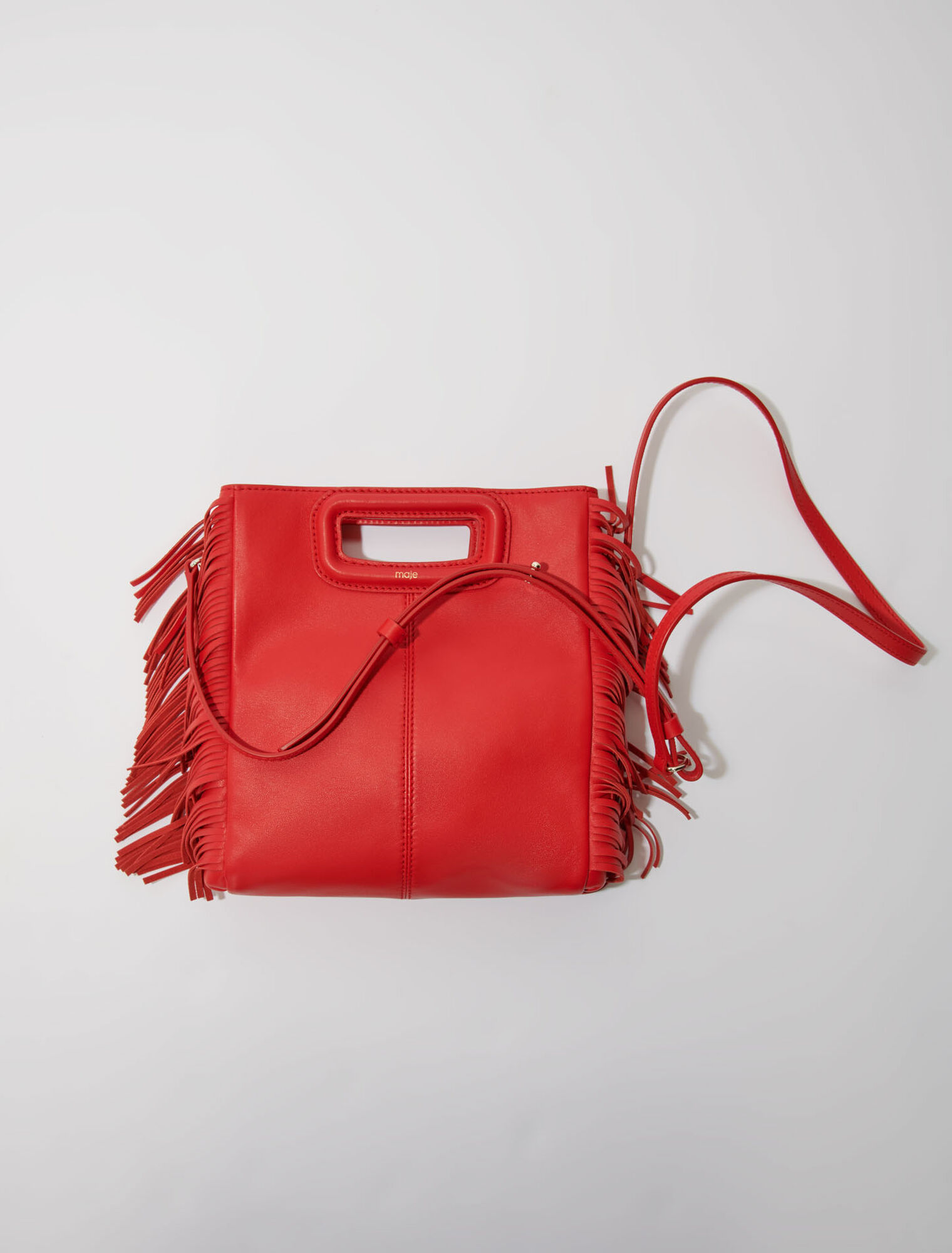 Smooth leather M bag with fringing