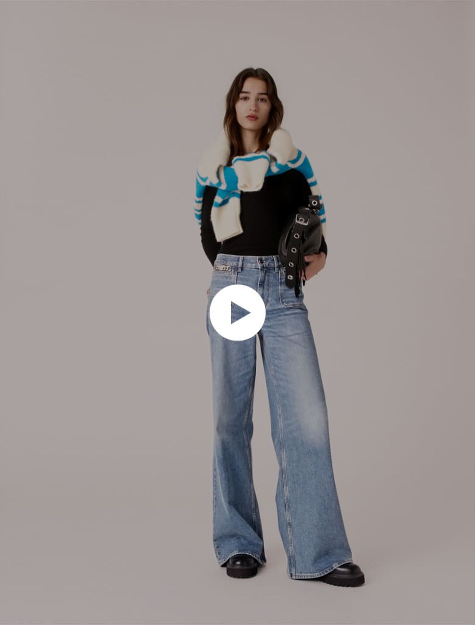 Flared jeans with chain