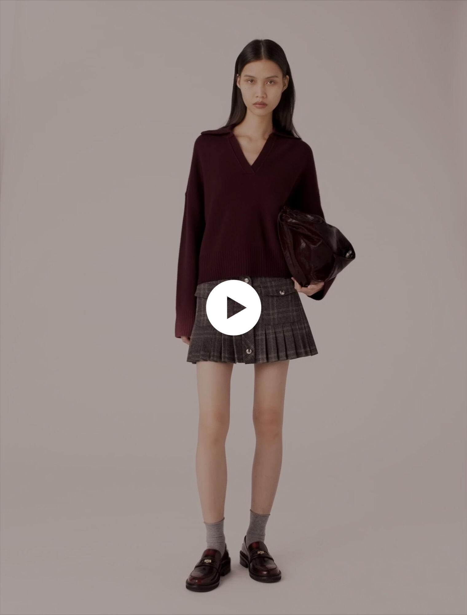 Short pleated checked skirt