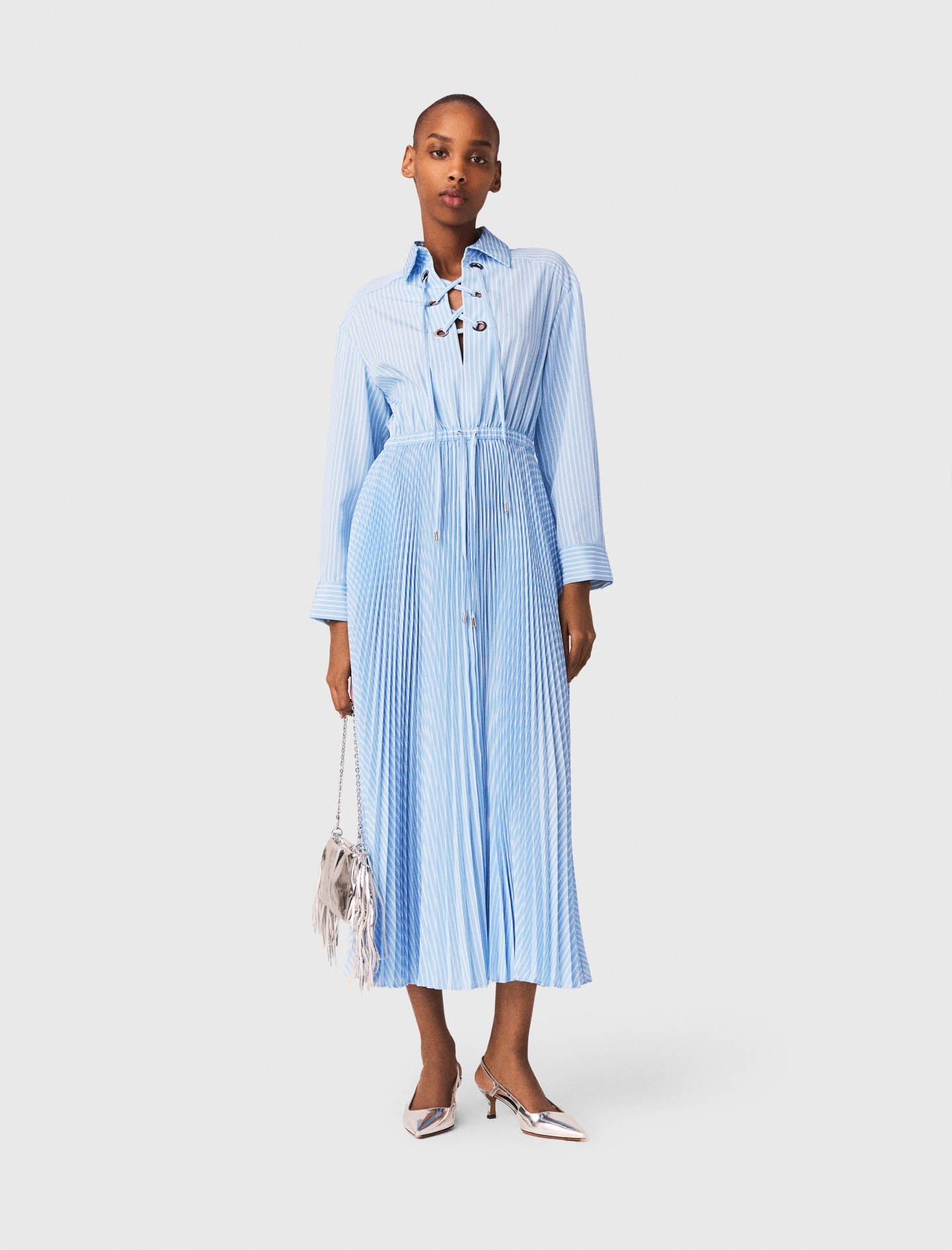 Long pleated dress with eyelets