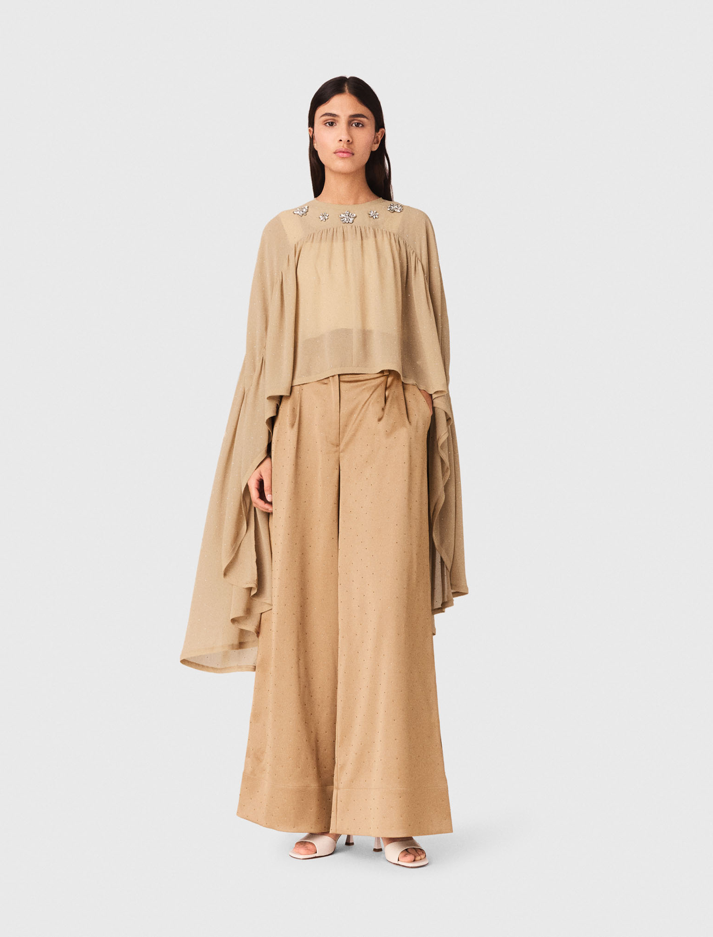 Cape top with jewel collar
